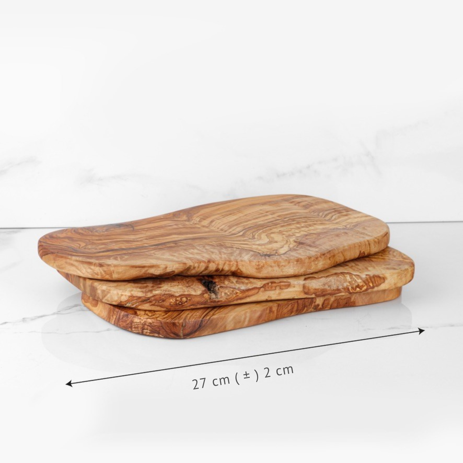 Rustikales Schneidebrett aus echtem Olivenholz mit einzigartiger Holzstruktur und langlebiger Verarbeitung für moderne Küchen in der Schweiz.
