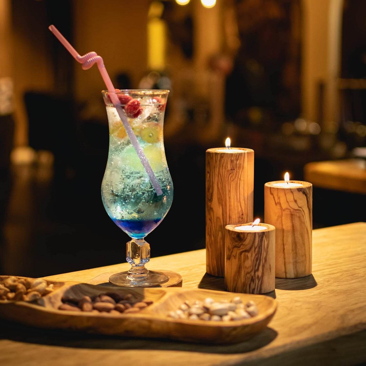 Luxuriöse Olivenholz-Kerzenhalter, nachhaltig hergestellt und in der Schweiz veredelt